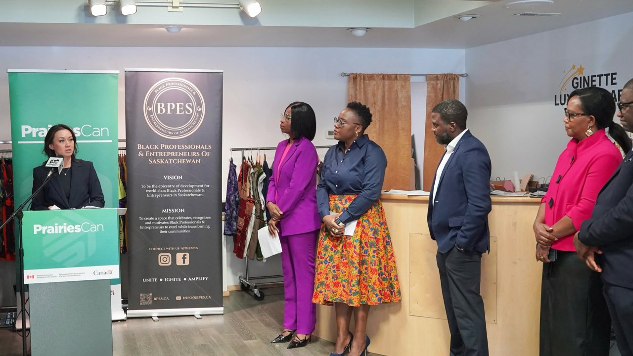 PrairiesCan announcing federal funding support for CoBSMEs, with the BPES banner and guests